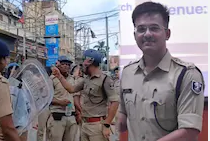"Patna West SP Sanket Kumar leads police personnel during a student protest near JP Golambar in Patna, as clashes, lathi charge, water cannon, and tear gas were used to control the crowd