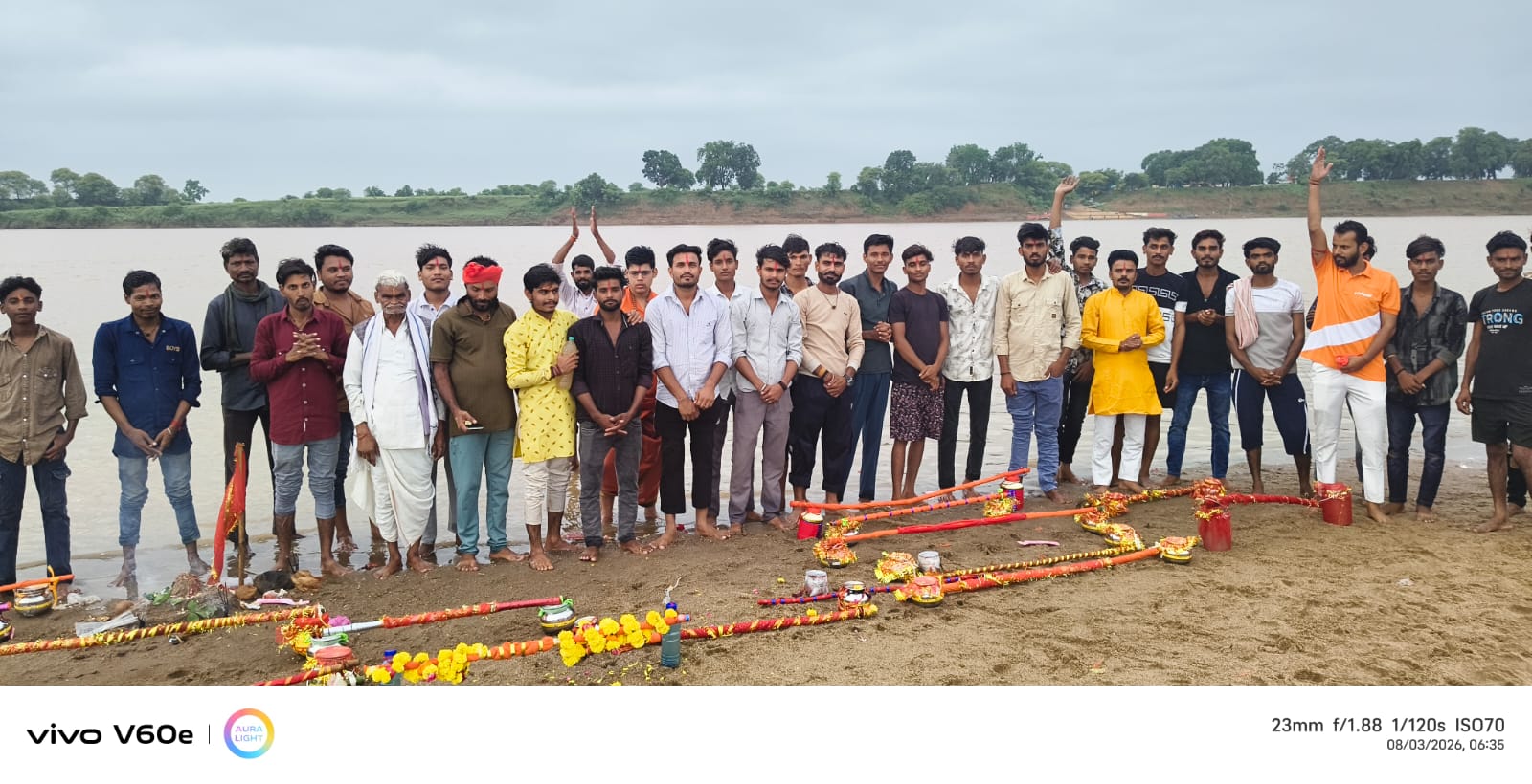 Around 40 young Kanwar pilgrims from Dilhari carry sacred Narmada water after a 35-kilometre foot pilgrimage and perform a ceremonial Jalabhishek of Lord Shiva at a village temple during the holy month of Sawan
