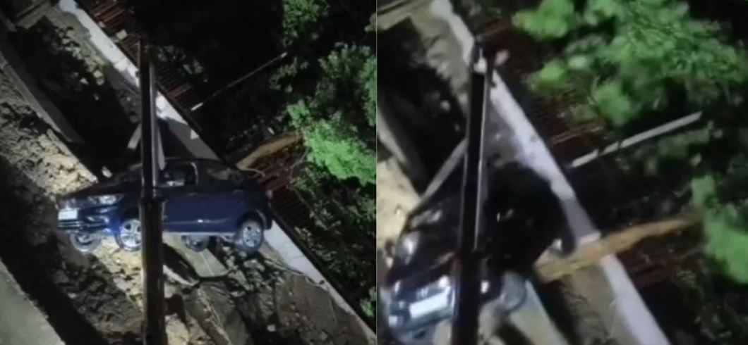 भोपाल के कोलार में अचानक धंसी सड़क, गड्ढे में समाईं कई गाड़ियां; आठ मंजिला इमारत के रहवासियों में दहशत